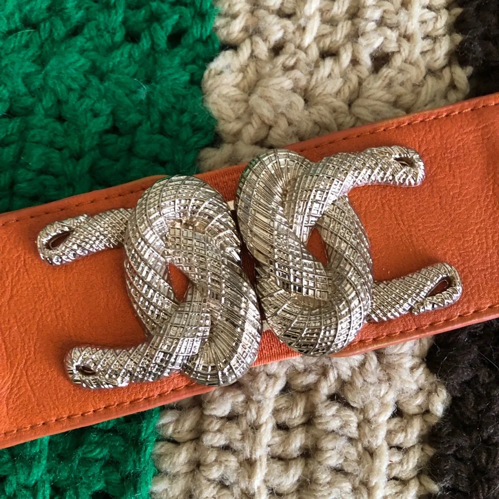 vtg unbranded orange elastic belt best fits L-XL
